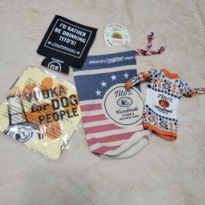 Assortment of Tito’s Swag- drawstring bag, bottle sweater, doggie bandana & more